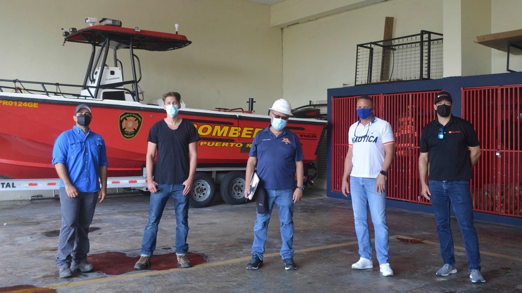 Firefighters at the Cataño, Puerto Rico fire station pose for a photo. (Ana Umpierre/Direct Relief)