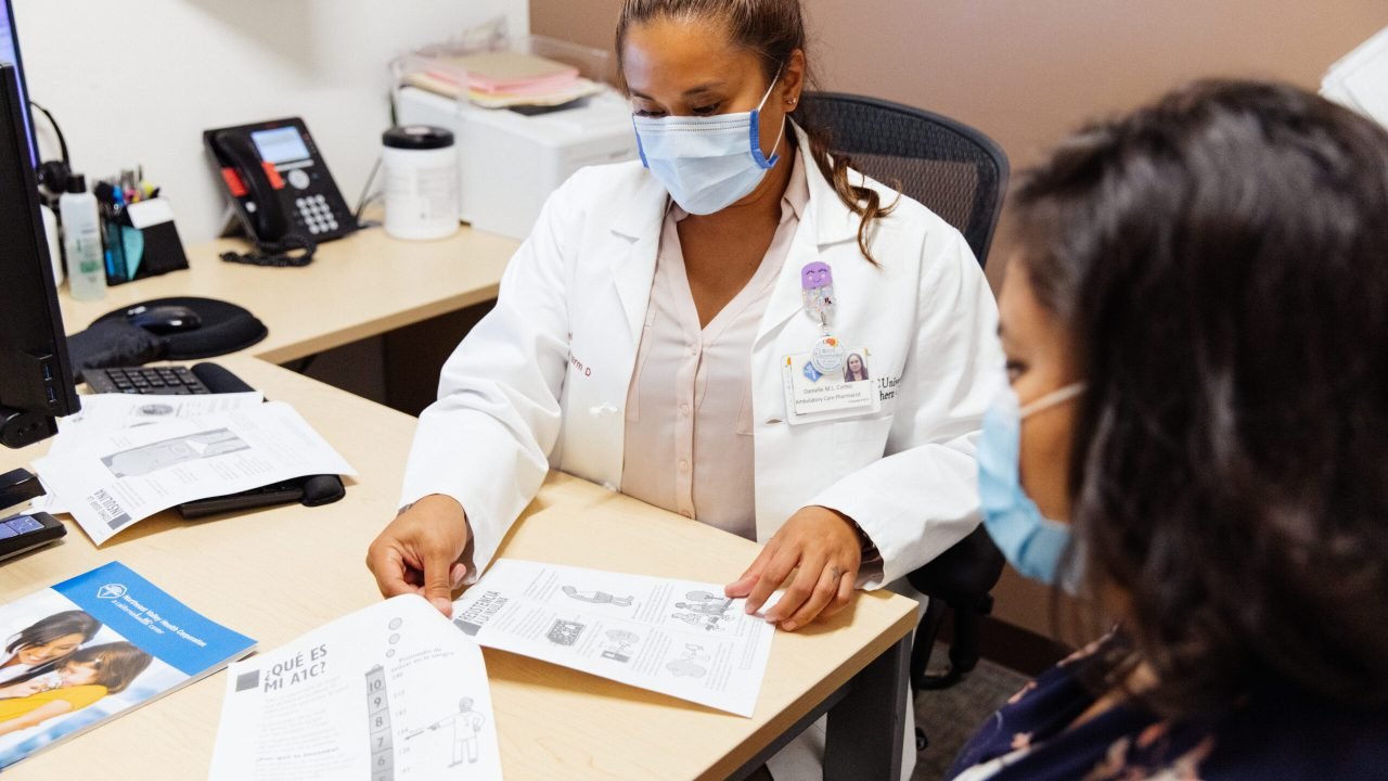 Dr. Danielle Cortez, Clinical Pharmacist at Northeast Valley Health Center, evaluates a patient.